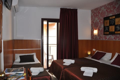 Triple Room, Balcony | In-room safe, desk, blackout drapes, free WiFi