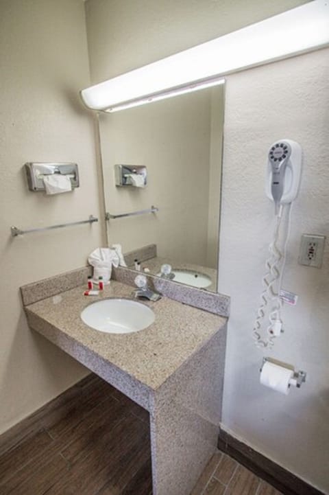 Room, 1 King Bed, Non Smoking (Hearing) | Bathroom | Combined shower/tub, hair dryer, towels, soap