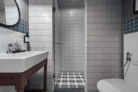 Shower, free toiletries, hair dryer, slippers