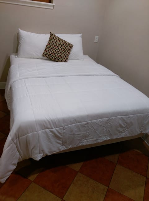 Economy Suite, 1 Queen Bed, Kitchenette | Desk, iron/ironing board, free WiFi, bed sheets