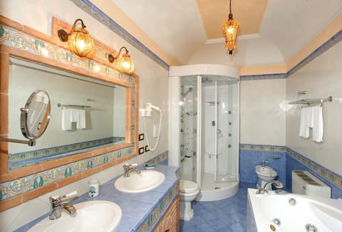 Junior Suite, Sea View | Bathroom | Free toiletries, hair dryer, bidet, towels