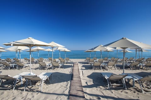 On the beach, sun loungers