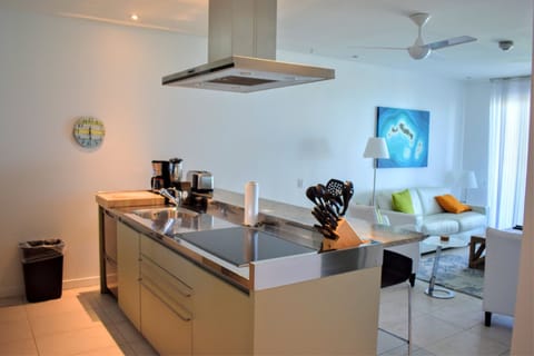 Suite, 1 Bedroom, Oceanfront | Private kitchen | Fridge, microwave, dishwasher, coffee/tea maker