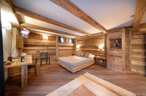 Luxury Quadruple Room, Mountain View | In-room safe, desk, blackout drapes, soundproofing