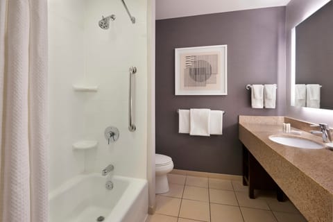 Room, 2 Queen Beds | Bathroom | Shower, designer toiletries, hair dryer, towels