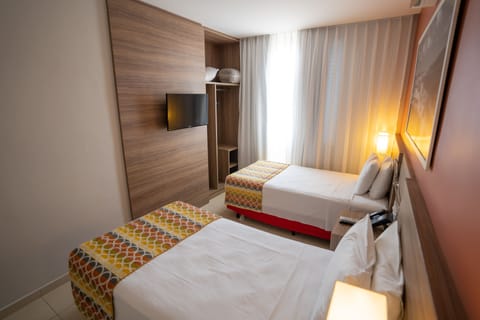 Family Suite | Minibar, in-room safe, blackout drapes, free WiFi