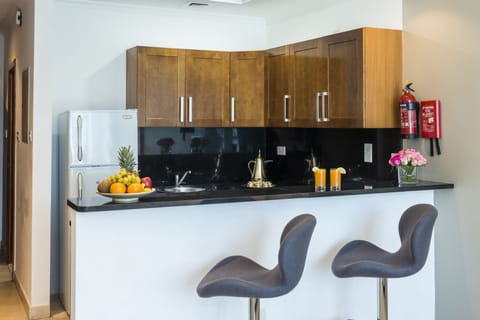 Fridge, microwave, cookware/dishes/utensils