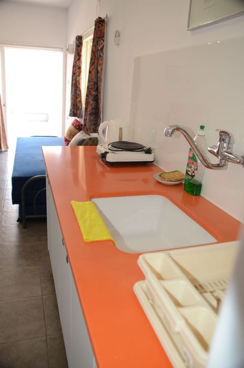 Studio, Patio | 1 bedroom, desk, iron/ironing board, free cribs/infant beds