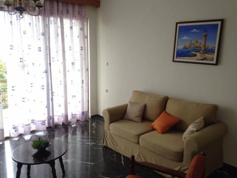 Apartment, 2 Bedrooms | Living room | Flat-screen TV