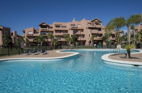 Outdoor pool, pool umbrellas, sun loungers