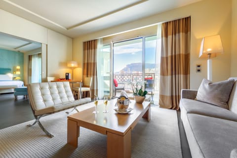 Suite, Sea View | Living area | Flat-screen TV, pay movies