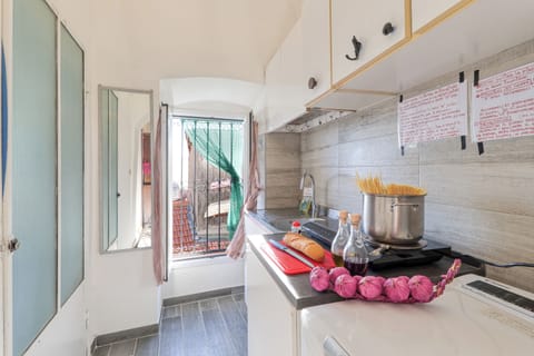 Standard Apartment, Multiple Bedrooms (App.Finestre Blu Della Pigna) | Private kitchen | Fridge, stovetop, coffee/tea maker, cookware/dishes/utensils