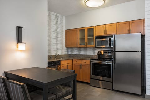 Suite, 2 Bedrooms | Private kitchen | Fridge, microwave, stovetop, dishwasher