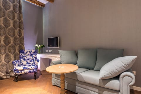 Deluxe Double Room, Balcony, Partial Sea View | Living area | 32-inch flat-screen TV with satellite channels, TV