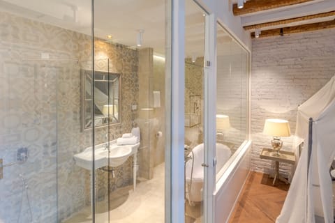 Deluxe Double Room, City View | Bathroom | Designer toiletries, hair dryer, slippers, towels