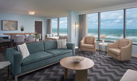 Suite, 1 Bedroom, Oceanfront | Living area | 55-inch flat-screen TV with satellite channels, TV, Netflix