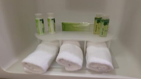 Designer toiletries, hair dryer, towels, soap