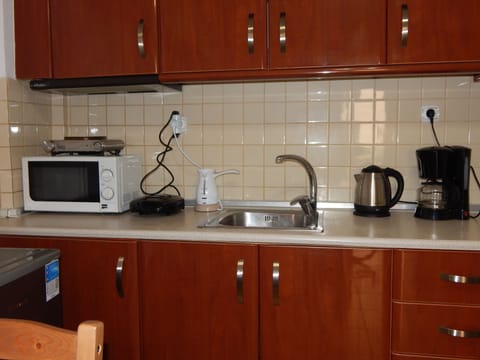 Fridge, microwave, stovetop, espresso maker