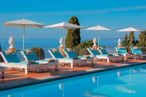 Seasonal outdoor pool, pool umbrellas, sun loungers