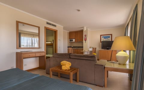 Junior Suite (Special) | Living area | 32-inch LCD TV with cable channels, TV