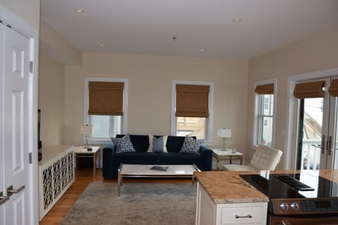 Luxury Condo, 1 Queen Bed, Kitchen, Bay View | Living area | 52-inch flat-screen TV with cable channels, TV, streaming services