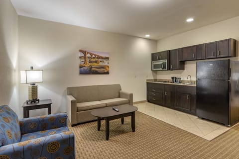 Suite, 1 Bedroom, Accessible (Accessible Suite with Roll-In Shower) | Private kitchen | Full-size fridge, microwave, stovetop, coffee/tea maker