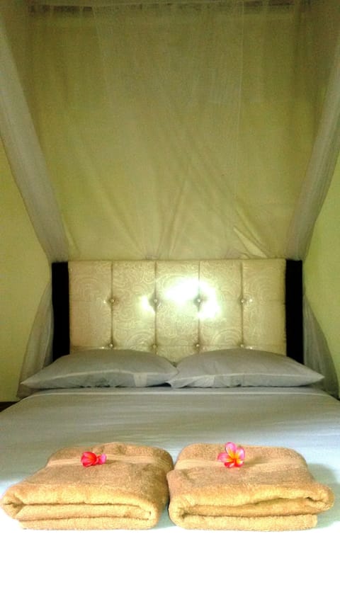 Standard Room with Fan | 1 bedroom, in-room safe, desk, rollaway beds