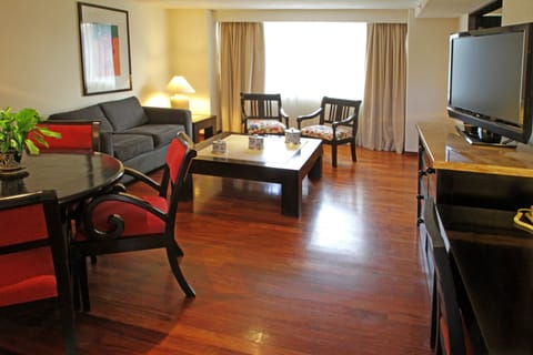 Executive Suite, 1 Bedroom | Living room | 32-inch LCD TV with satellite channels, TV