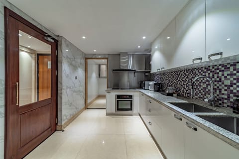 Grand Apartment | Private kitchen | Full-size fridge, microwave, electric kettle, highchair