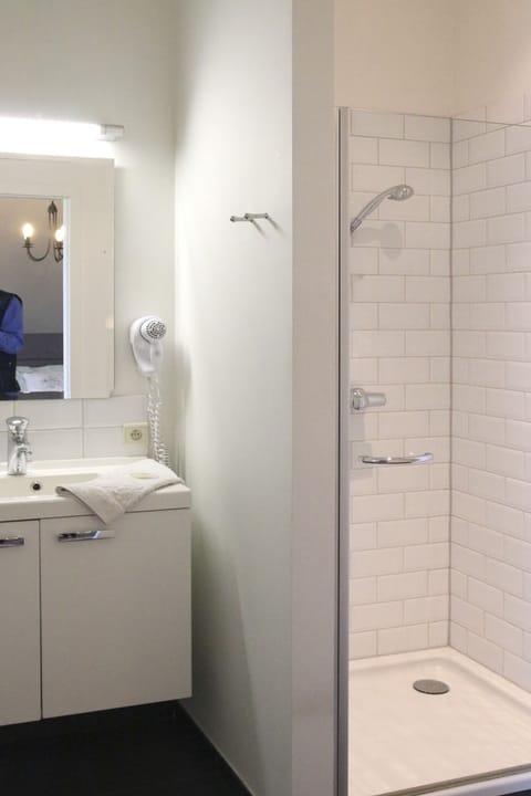 Shower, free toiletries, hair dryer, bathrobes