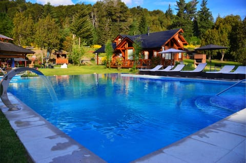 Indoor pool, outdoor pool, pool umbrellas, sun loungers