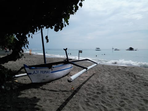 Beach nearby, black sand, beach towels