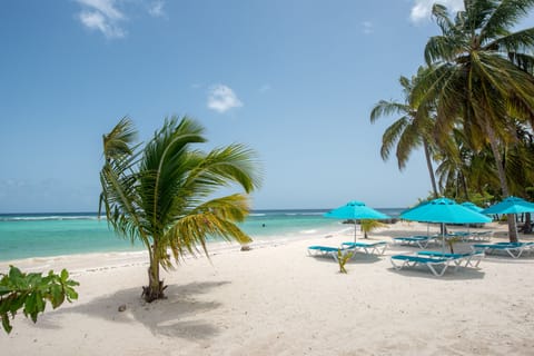 On the beach, white sand, beach towels