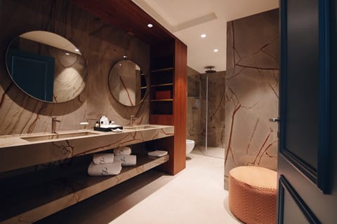 Suite | Bathroom | Hair dryer, bathrobes, slippers, bidet