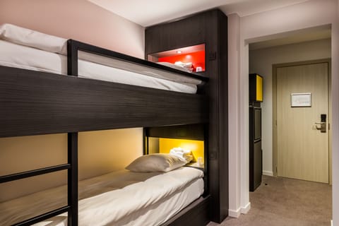 Standard Quadruple Room | Minibar, in-room safe, desk, soundproofing