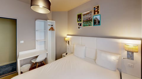 Premium bedding, blackout drapes, iron/ironing board, free WiFi