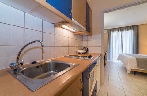 Studio, Partial Sea View | Private kitchenette | Full-size fridge, microwave, stovetop, electric kettle