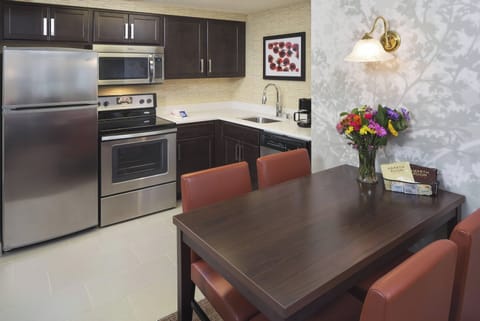 Suite, 2 Bedrooms | Private kitchen | Full-size fridge, microwave, stovetop, dishwasher