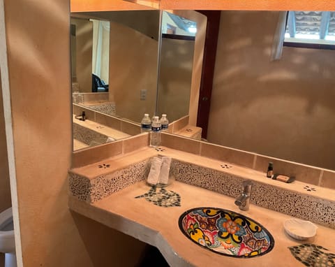 Separate tub and shower, jetted tub, free toiletries, hair dryer