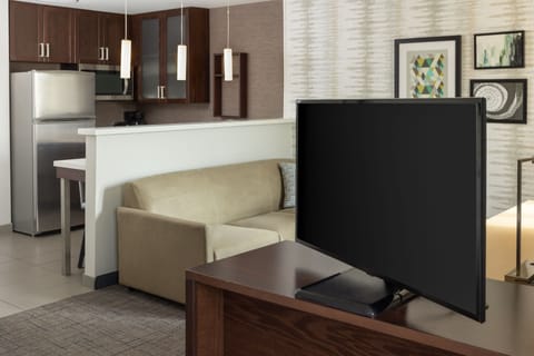 32-inch flat-screen TV with satellite channels, TV, pay movies