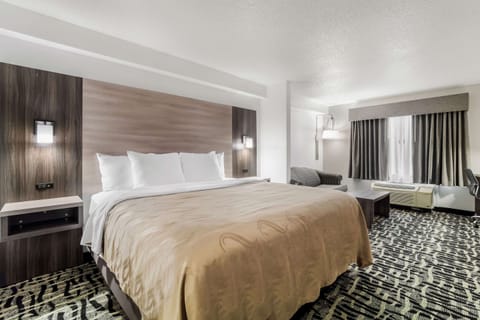 Suite, 1 King Bed, Non Smoking | Premium bedding, desk, laptop workspace, blackout drapes