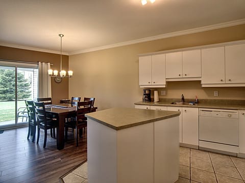 Condo, 2 Bedrooms | Private kitchen | Full-size fridge, microwave, oven, stovetop