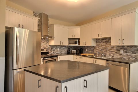 Condo, 2 Bedrooms | Private kitchen | Full-size fridge, microwave, oven, stovetop