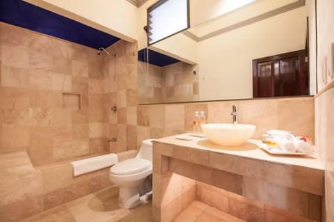 Suite (Lycaste) | Bathroom | Combined shower/tub, deep soaking tub, free toiletries, towels