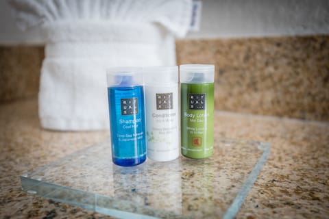 Combined shower/tub, eco-friendly toiletries, hair dryer, towels