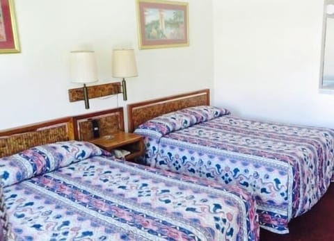 Standard Double Room, 2 Double Beds | Desk, iron/ironing board, free WiFi, bed sheets