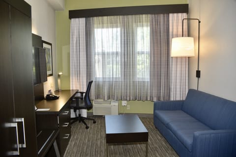 Suite, 1 King Bed, Jetted Tub | Desk, iron/ironing board, free cribs/infant beds, free WiFi