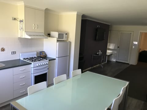 Apartment, Kitchen, Garden Area | Minibar, desk, iron/ironing board, free WiFi