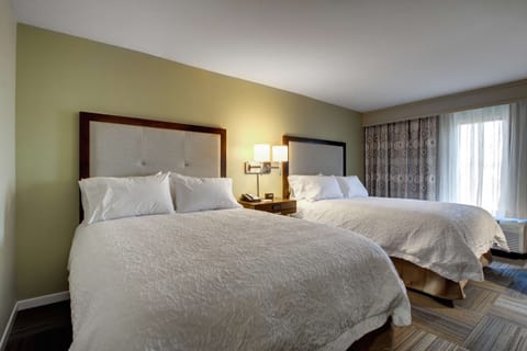 Room, 2 Queen Beds, Non Smoking, Refrigerator & Microwave | In-room safe, free cribs/infant beds, free WiFi, bed sheets