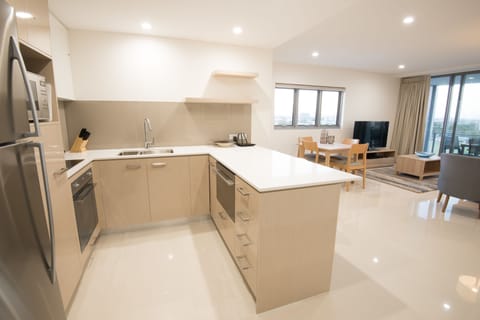 Two Bedroom Apartment | Private kitchen | Full-size fridge, microwave, stovetop, dishwasher